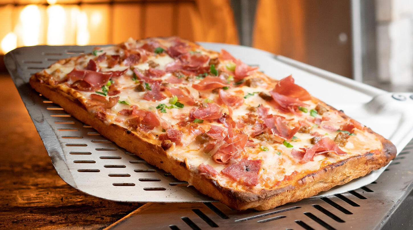 Open-flame pizza oven at Bistro 2two2